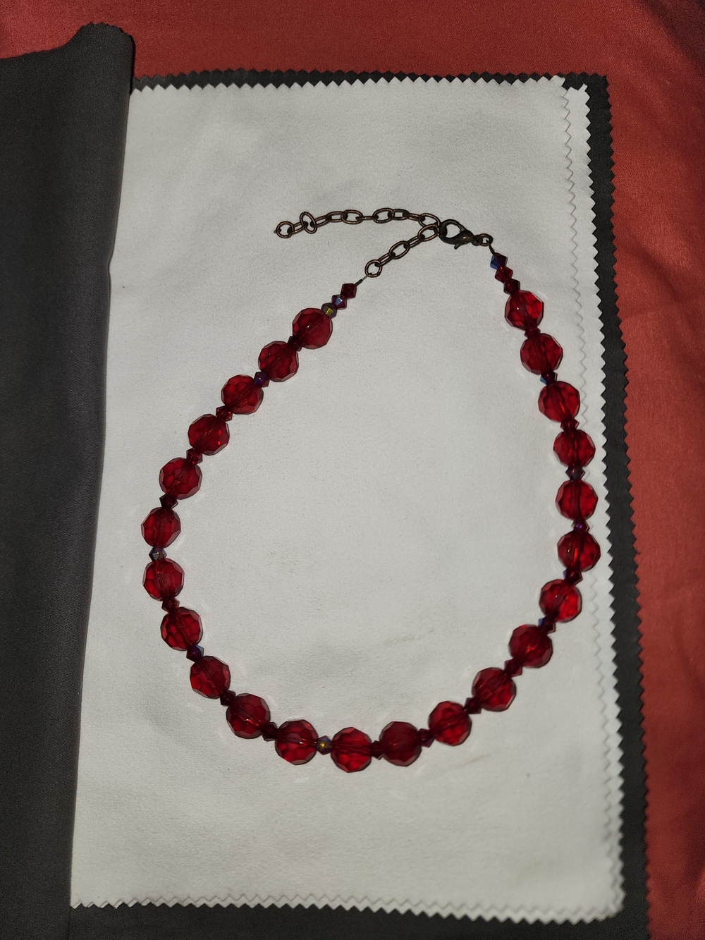 Vintage ruby red faceted glass beaded necklace.